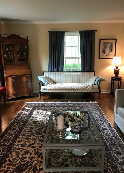 This sitting room was literally “brought into the light” by installing a new ceiling fixture that transforms it into a more inviting space.  The new gray and blue color scheme serves as a beautiful backdrop for the family’s wonderful collection of Chinese porcelain and furniture.